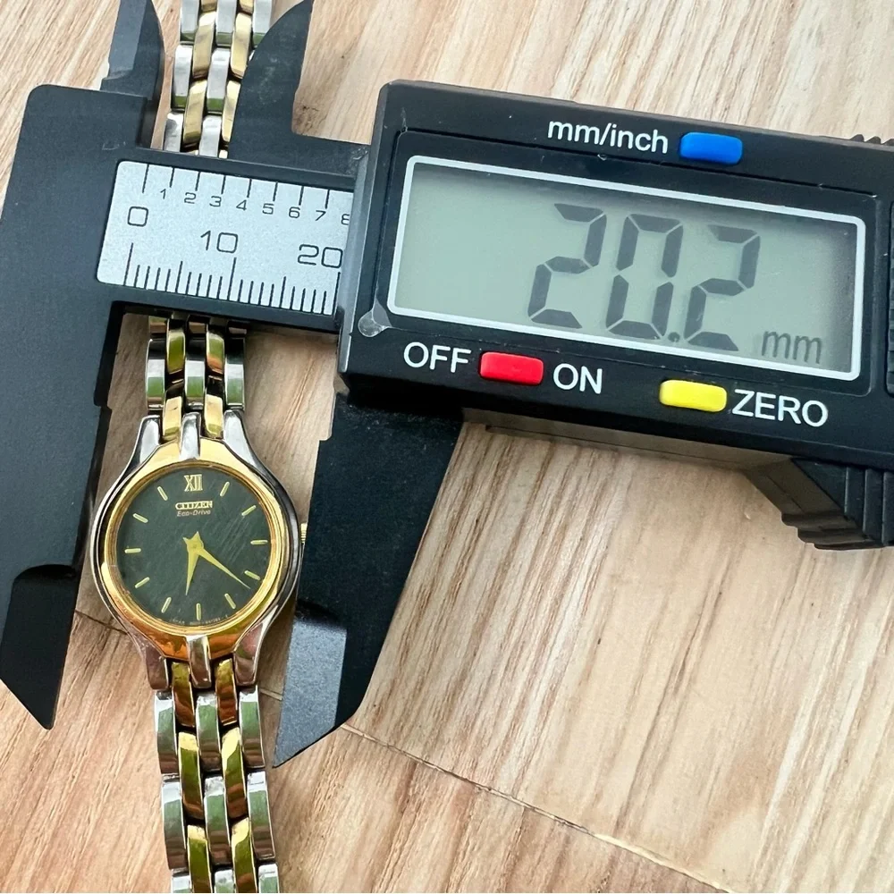 Citizen eco drive ladies black dial two tone dress solar watch